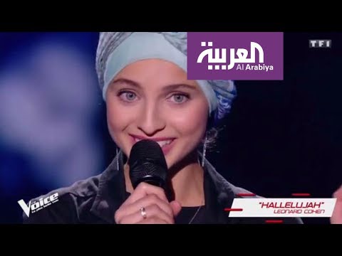 شاهد سورية تبهر برنامج ذا فويس فرنسا بأنشودة عربية