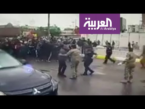 شاهد تدافع الأمن العراقي وزوار كسروا حظر التجول في الكاظمية